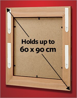 A frame holding a maximum size of 60x90cm using 4 sets of X-Large picture hanging strips.