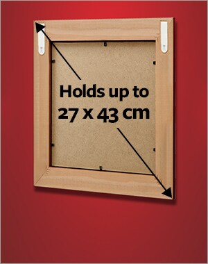 A frame holding a maximum size of 27x43cm using 2 sets of medium or narrow picture hanging strips.