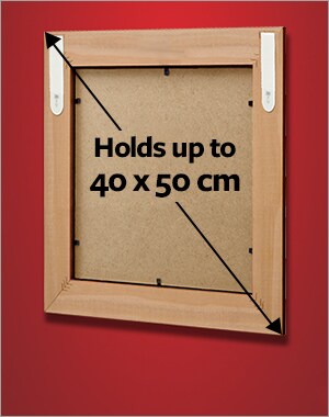 A frame holding a maximum size of 40x50cm using 2 sets of large picture hanging strips.